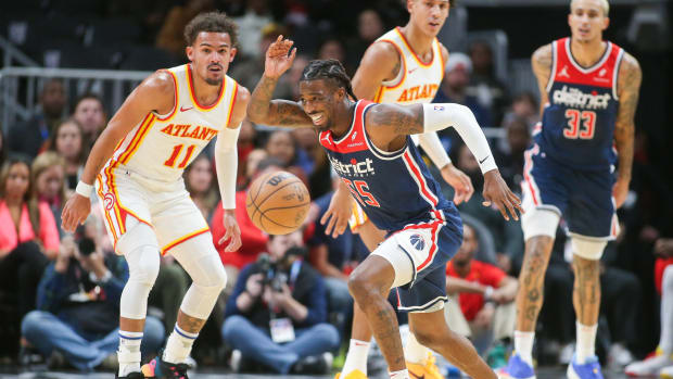 Nov 1, 2023; Atlanta, Georgia, USA; Washington Wizards guard Delon Wright (55) reaches for a loose ball against the Atlanta Hawks in the second quarter at State Farm Arena. Mandatory Credit: Brett Davis-USA TODAY Sports
